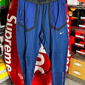 Nike running pants, slim fit, size M